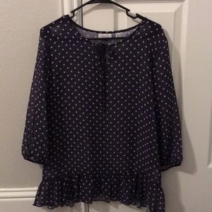 Pokadot top with tie neck.